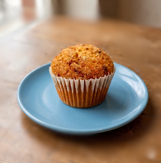 photo of muffin town coffee cake muffin on blue plate