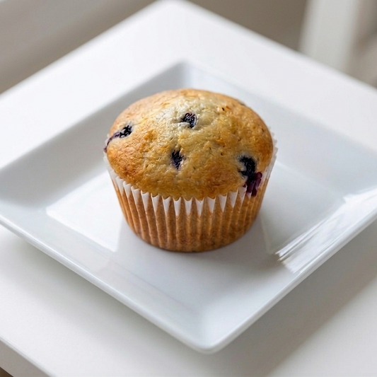 smart choice Blueberry muffin on a white square plate