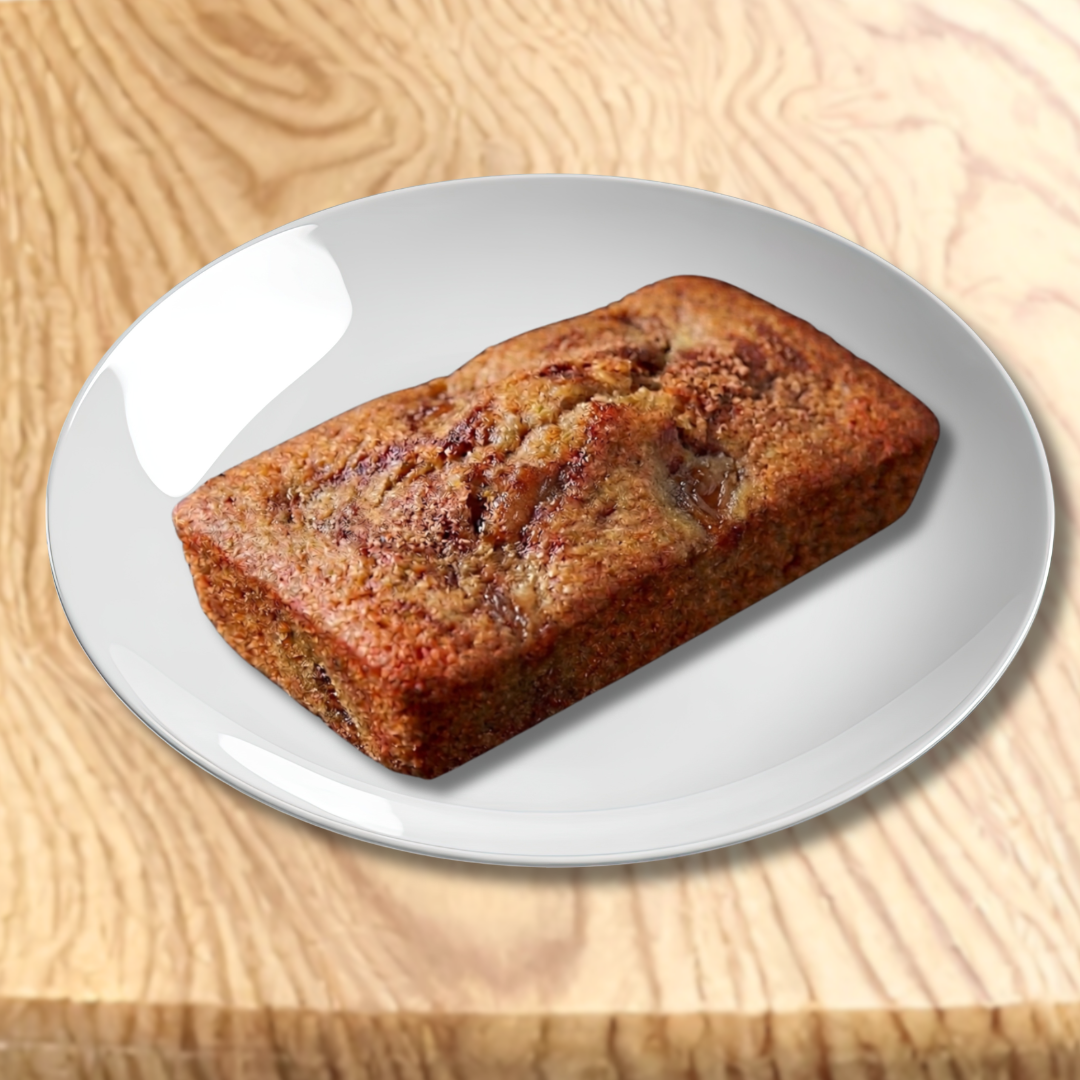bread pudding bar on a white plate with a wooden background